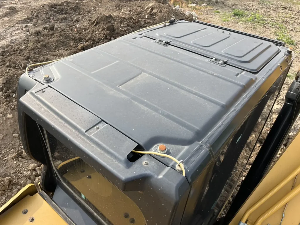 Used 2022 CAT 320GC excavator, cab roof and exterior panels